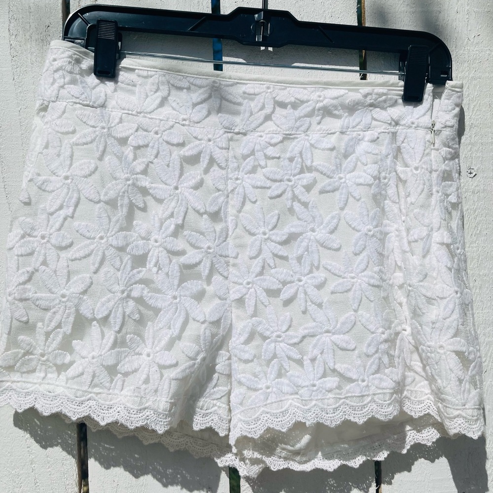 Monteau Women white lace shorts.